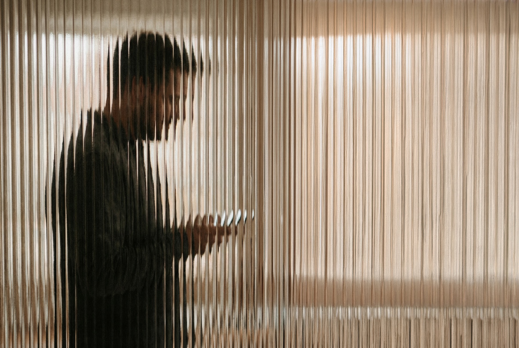 Abstract privacy visual through textured glass