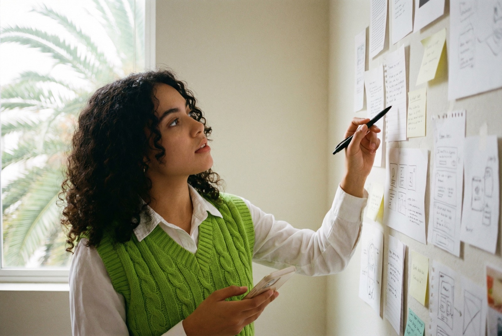 Strategist mapping priorities on a planning wall